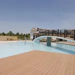 Homely Flat With Private Garden And Common Pool Апартаменти